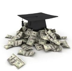 grad cap on pile of money